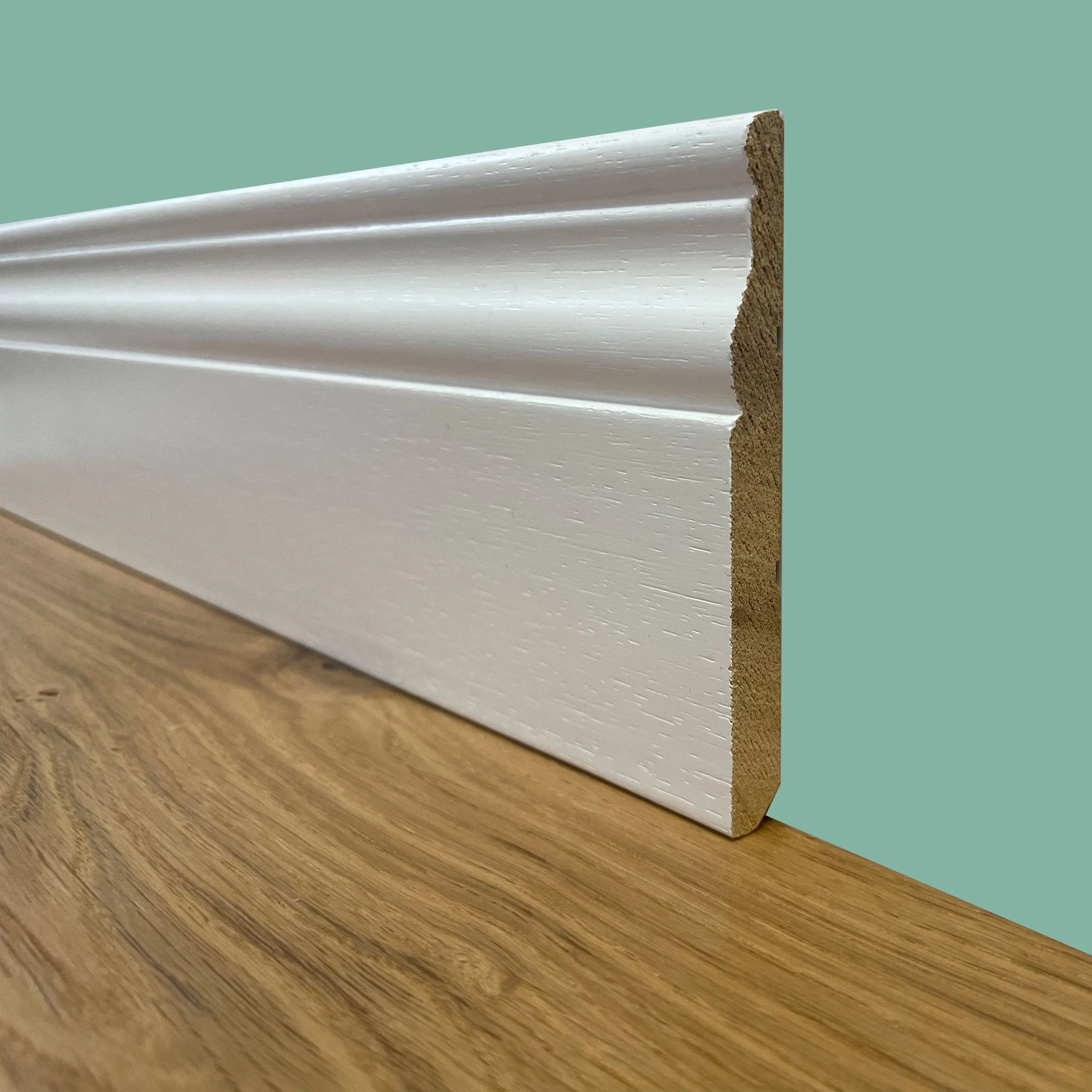 BATTISCOPA SLIM laccato bianco in legno MASSELLO DUCALE 100X10 (prezzo al ML)